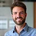 Portrett av prosjektleder, smilende og imøtekommende.