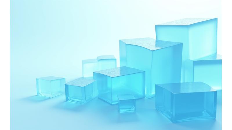 Havbris Interiør's vilkår representert av en gjennomsiktig, elegant glassform i sjøgrønt og blått